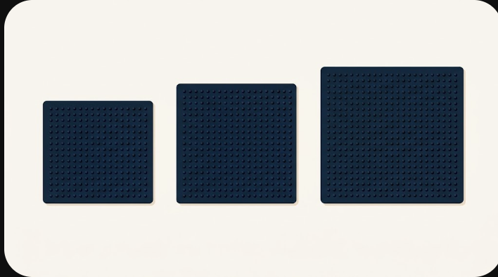 Three fuse-bead pegboards of increasing size side by side.