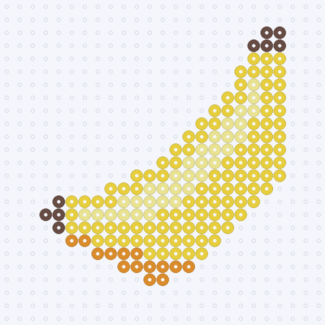 A curved Yellow banana with a Pastel Yellow highlight, a Honey lower edge and Brown tips, on a pegboard grid.