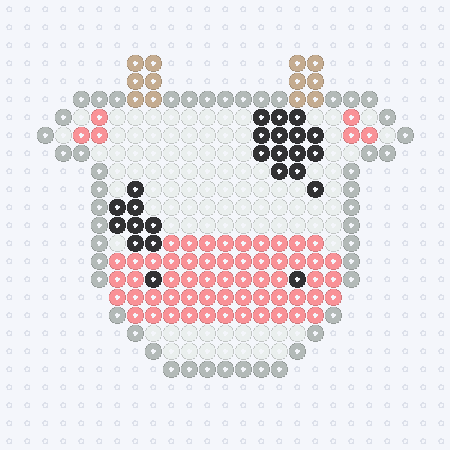 A White cow face with a Light Grey edge, Black patches, Tan horns and a Blush muzzle and inner ears, on a pegboard grid.