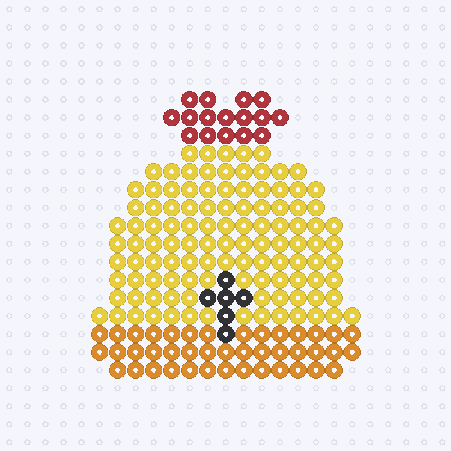 A yellow jingle bell fuse-bead pattern with a darker honey-colored rim, a black slot and a red bow on top, on a pegboard grid.