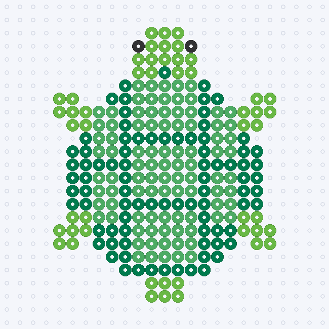 A top-down turtle fuse-bead pattern with a dark green shell, lighter green shell patches, a lime green head and four legs, with two black eyes, on a pegboard grid.